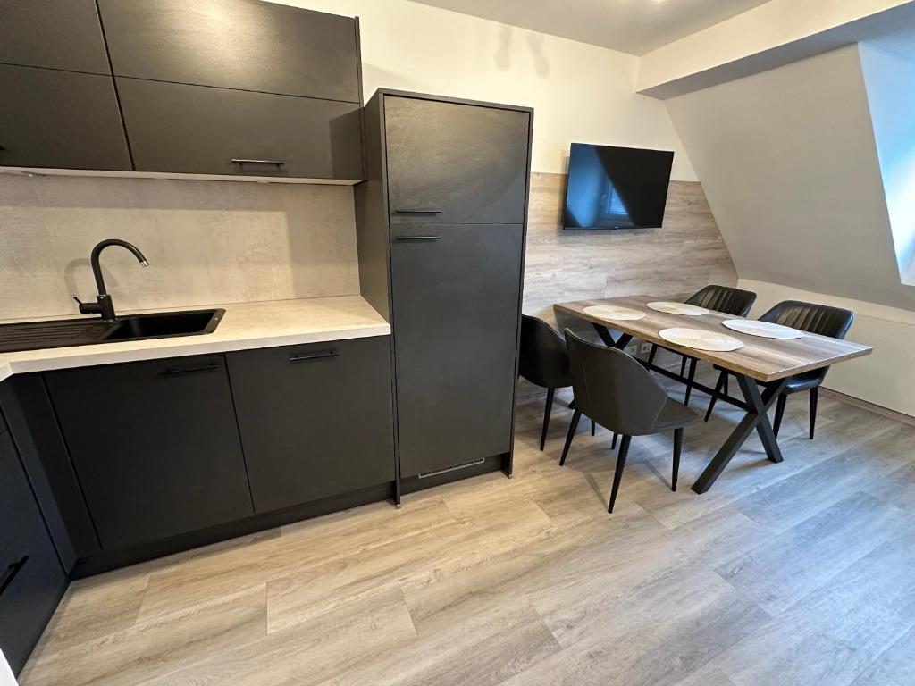 Nhà bếp/bếp nhỏ tại Rhaunen Apartments