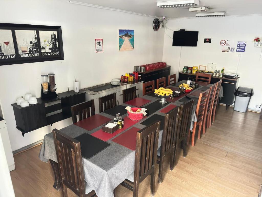 TV a/nebo společenská místnost v ubytování Hostal Empresarial Talca