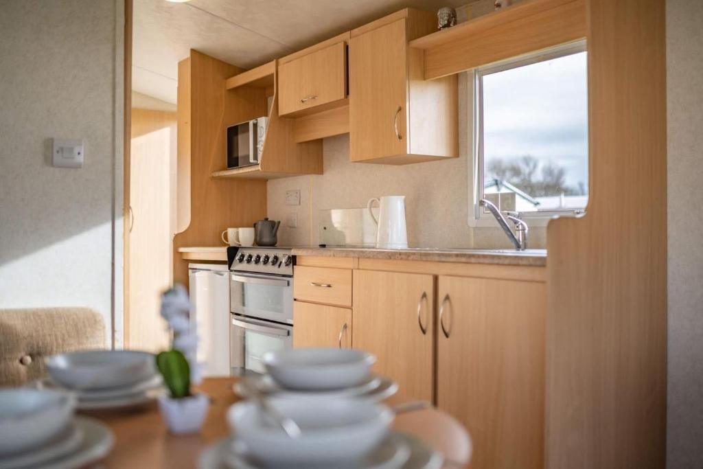 Køkken eller tekøkken på North Wales Coastal Stay