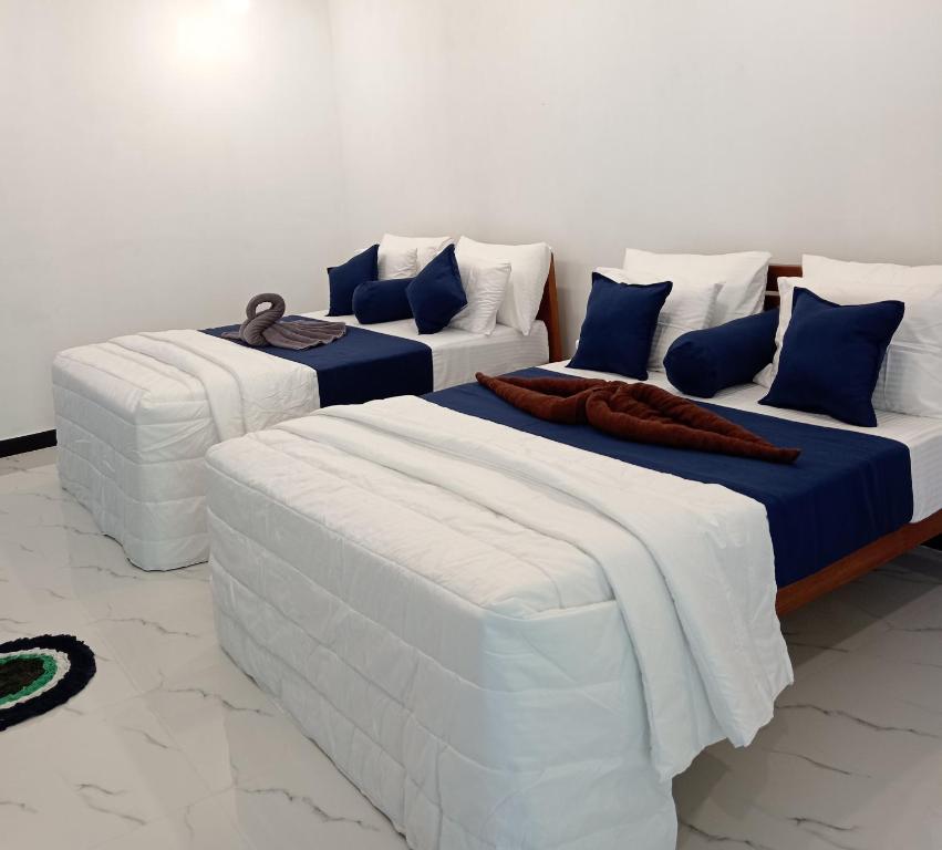 Postel nebo postele na pokoji v ubytování Camellia Inn