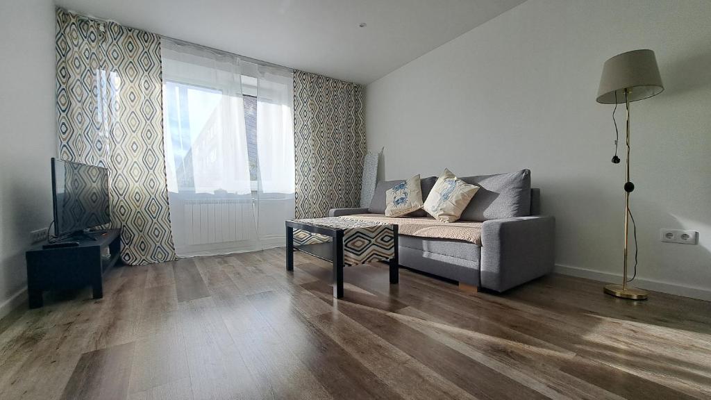 TV a/nebo společenská místnost v ubytování Sea Breeze Apartment