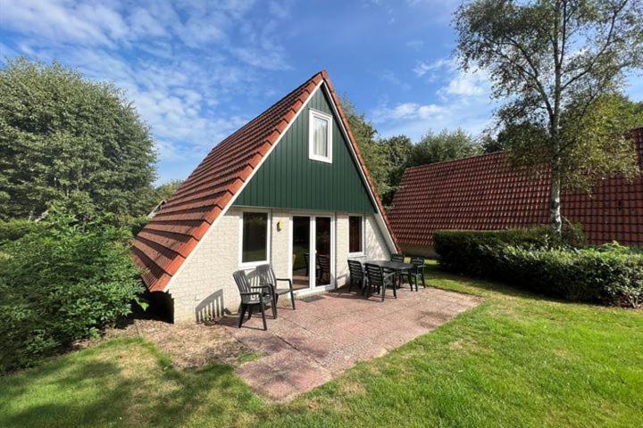 Κήπος έξω από το Leuke gezinswoning op Vakantiepark 't Hooge Holt
