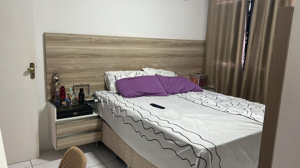 En eller flere senge i et værelse på Ap mobiliado Praia de Iracema