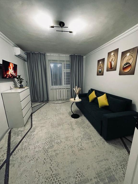 Et opholdsområde på Уютная квартира возле старого базара