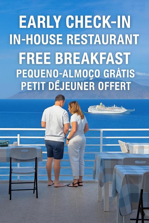 a man and a woman standing on a cruise ship at Cruzeiro Guest House in São Filipe