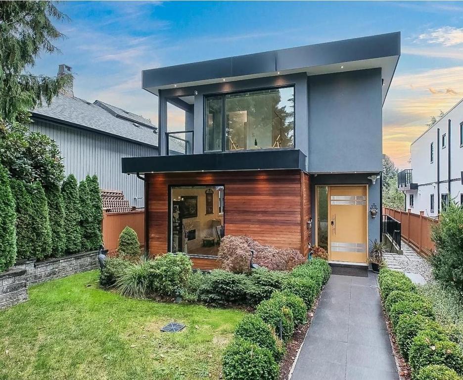 a house with a large window on top of it at A&A Resident in North Vancouver
