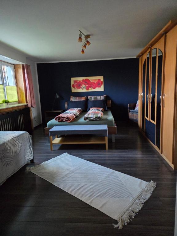 Postel nebo postele na pokoji v ubytování Ferienwohnung FeWe Wandern und Skifahren