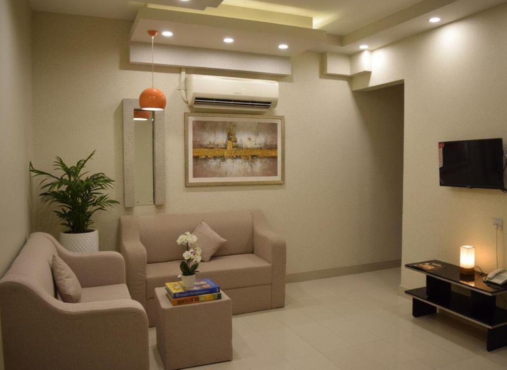 Posezení v ubytování Al-Bayraha Hotel Apartments