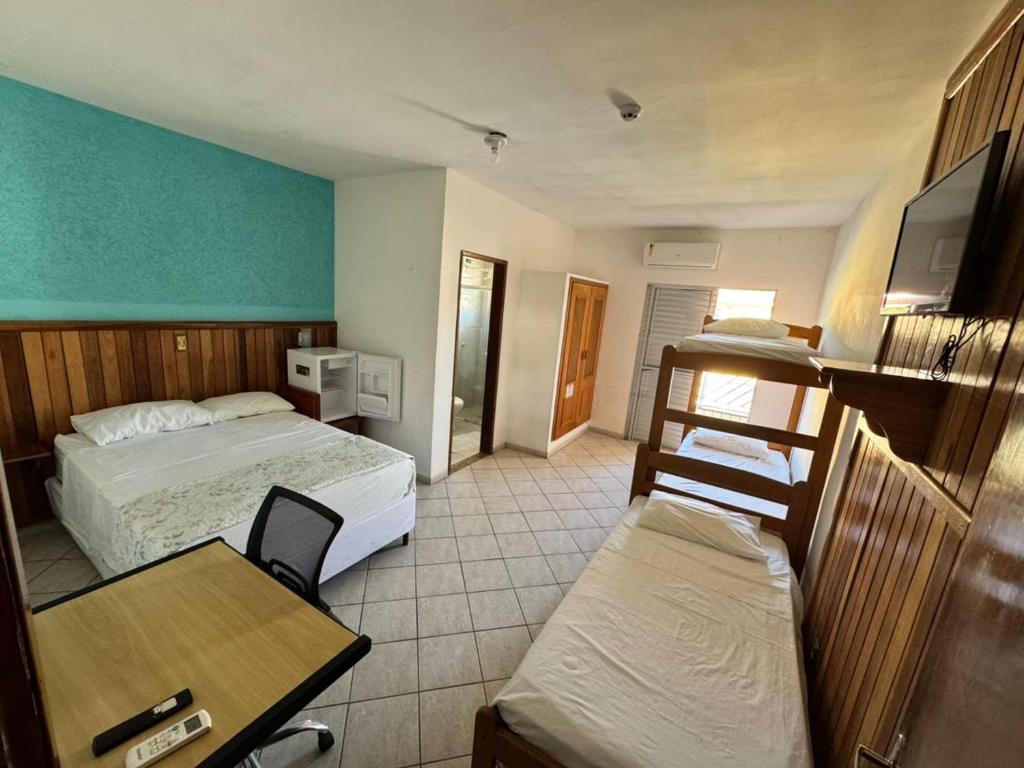 En eller flere senge i et værelse på Pousada Martin de Sá