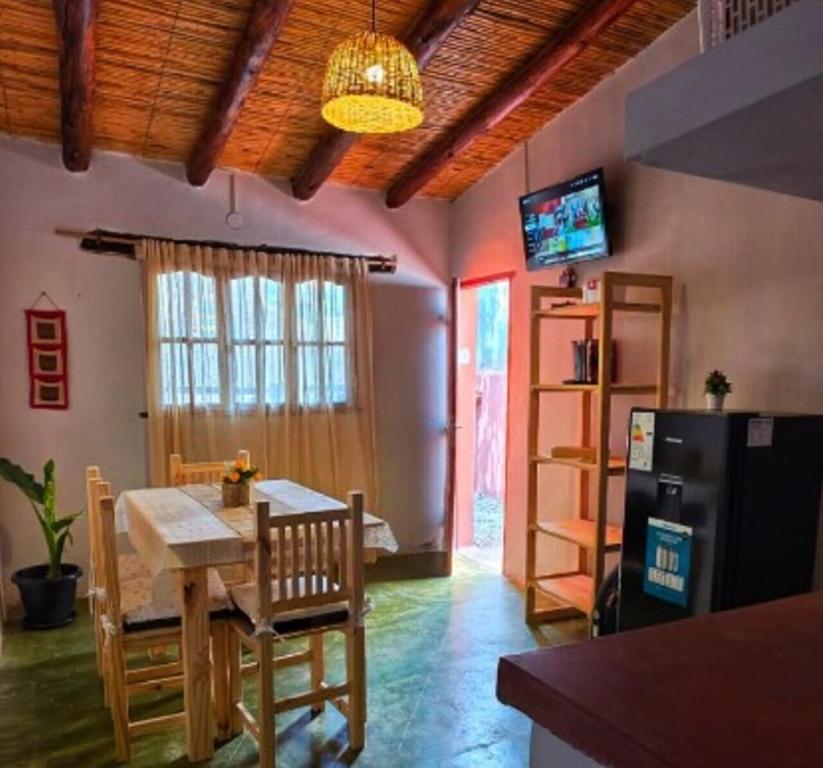 TV a/nebo společenská místnost v ubytování Tierra Norte - Cabañas