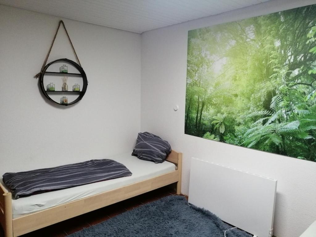 Postel nebo postele na pokoji v ubytování Quiet location in Schönau, free parking, balcony