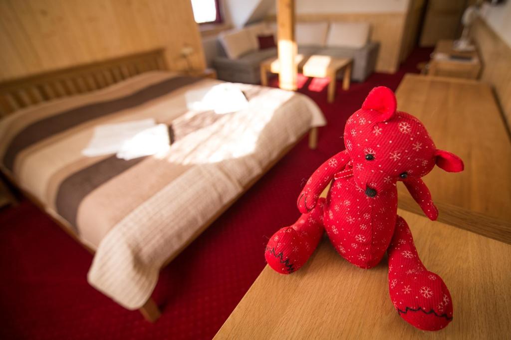 Postel nebo postele na pokoji v ubytování Penzion U Pacošů