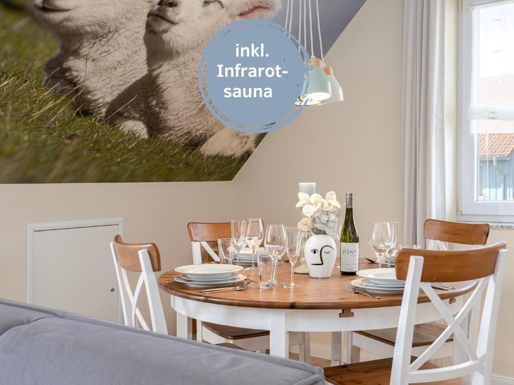 Гостиная зона в Lotsenkoje Fehmarn mit Balkon & Sauna, perfekt für Familien