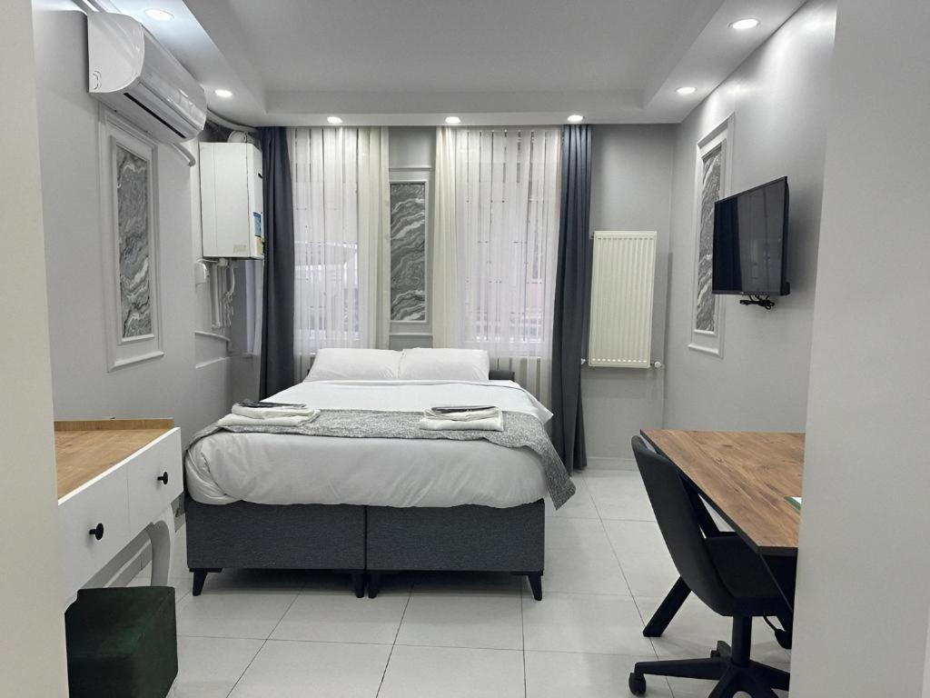 TV a/nebo společenská místnost v ubytování JOE BLACK APART