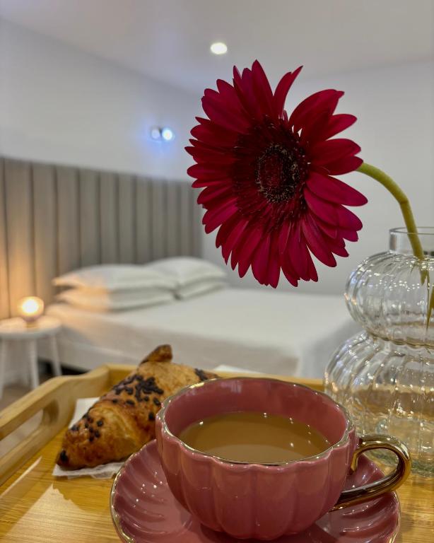 En eller flere senge i et værelse på Apartament Luna