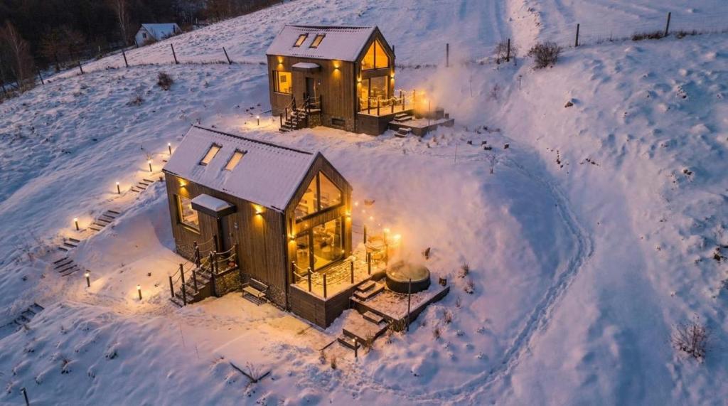an aerial view of a home in the snow at Oko na Sowie in Lutomia