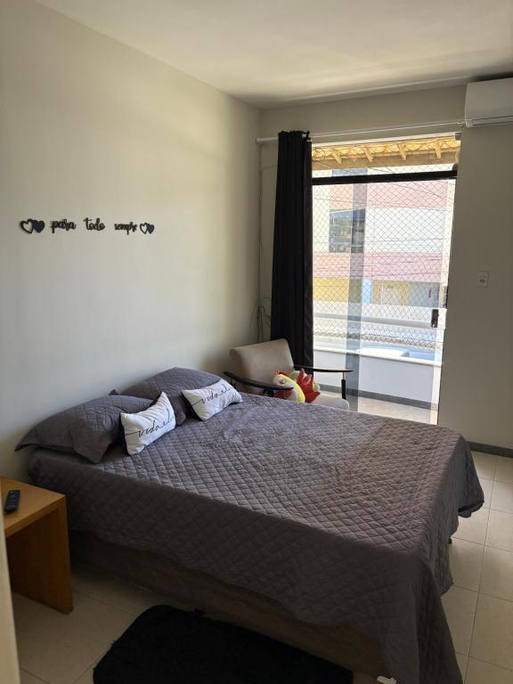 Ένα ή περισσότερα κρεβάτια σε δωμάτιο στο Residencial Orla de Atalaia