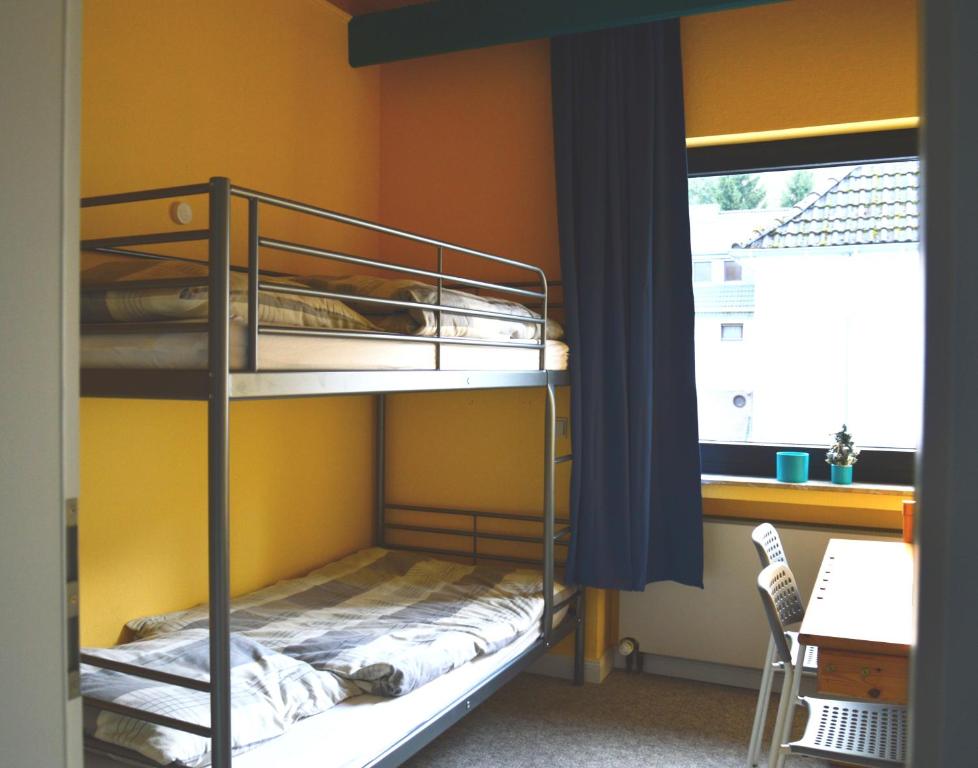 Postel nebo postele na pokoji v ubytování Eifelhaus4you