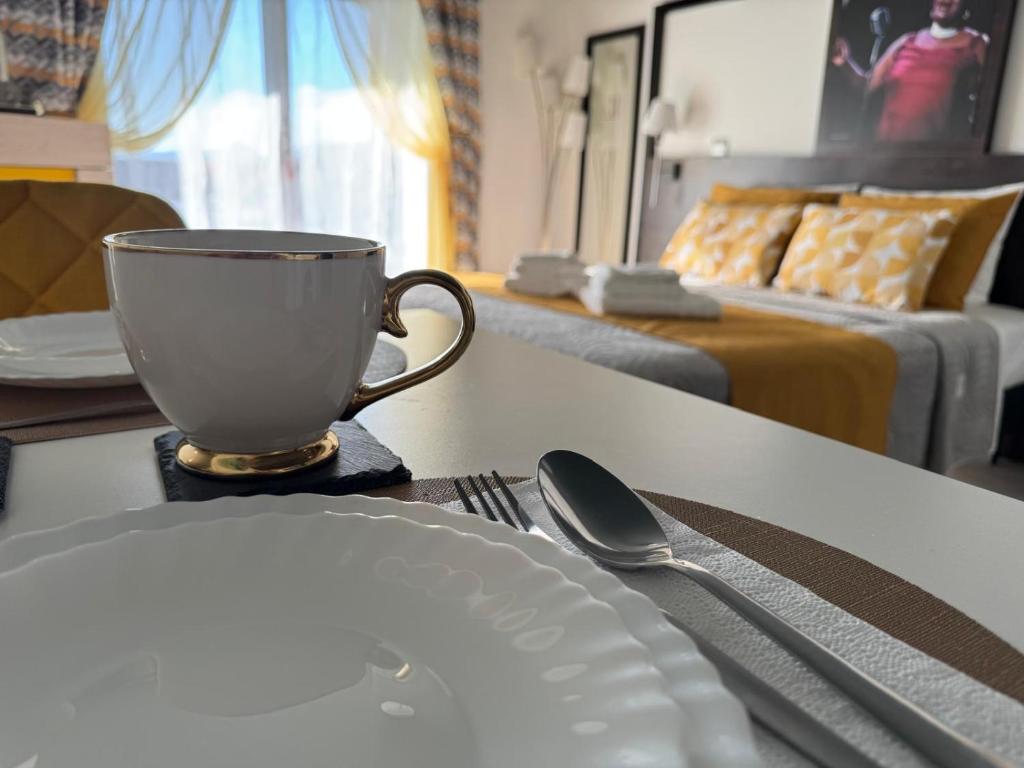 Ένα ή περισσότερα κρεβάτια σε δωμάτιο στο Cozy Studio in Cannes