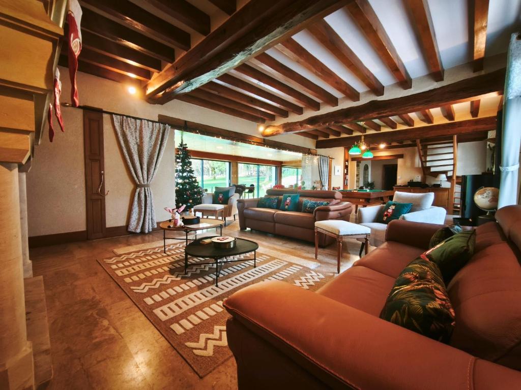 Χώρος καθιστικού στο Lou Cantou sur Lunain-Piscine & SPA nordique