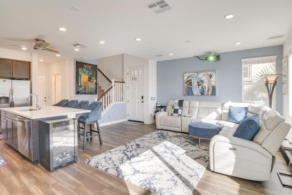 a living room with a couch and a table at Home Theater System and Gazebo Los Angeles Getaway! in San Fernando
