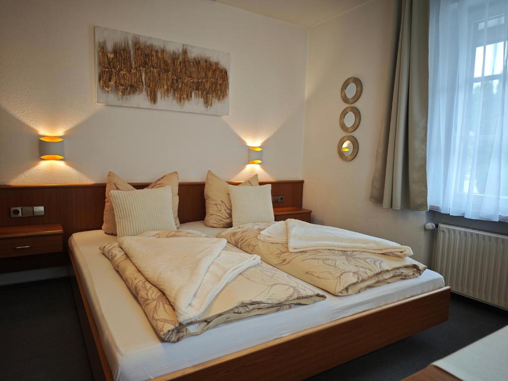 Кровать или кровати в номере Pension Villa Sarah