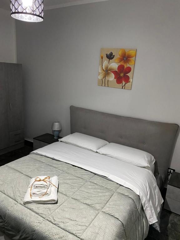 Una cama o camas en una habitación de Cuor di Leone