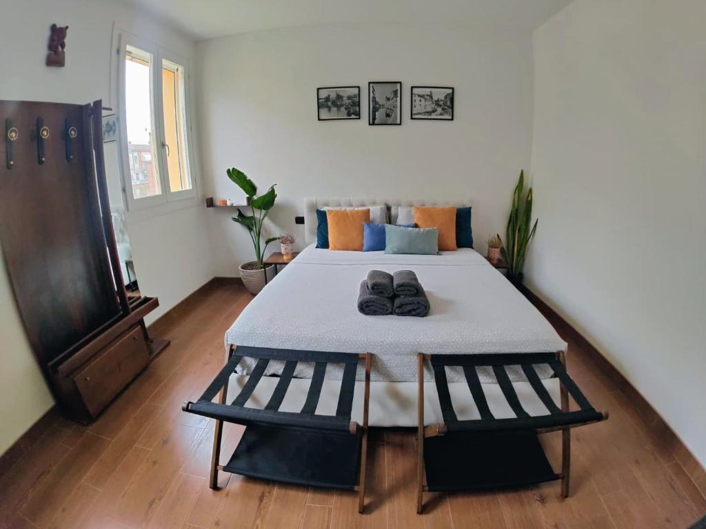 Кровать или кровати в номере Chez Nous