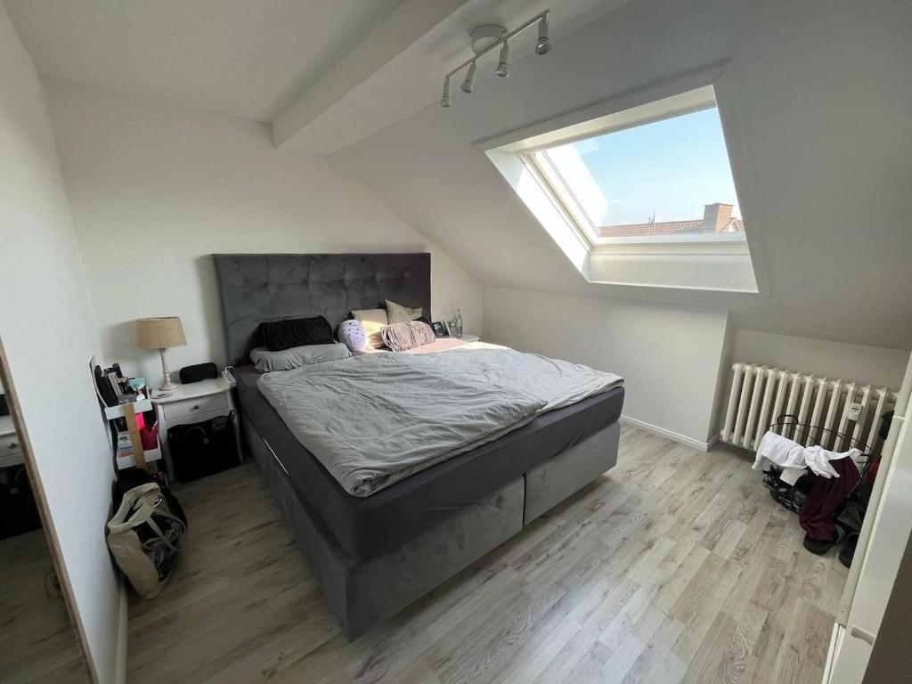 En eller flere senge i et værelse på Cozy apartment near HDZ-GOP