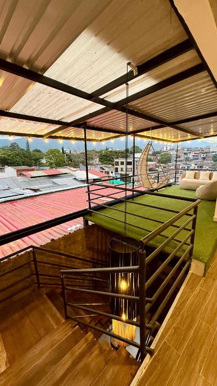 a room with a roof with a tennis court at Hotel TOBA Boutique in Ibagué
