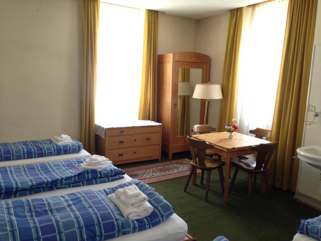 Postel nebo postele na pokoji v ubytování Hotel Quellenhof
