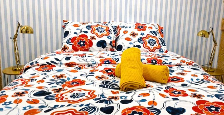 Кровать или кровати в номере Art Apartments Leiria Historic House