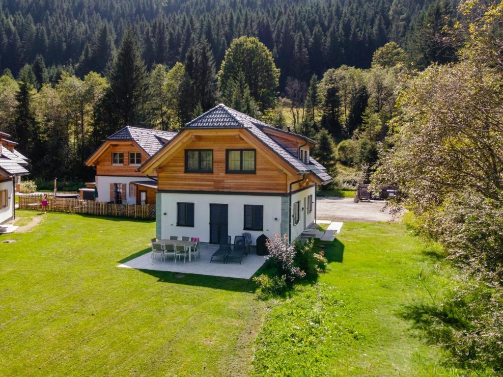 an aerial view of a house with a yard at Riesner Alm 35 in Donnersbachwald