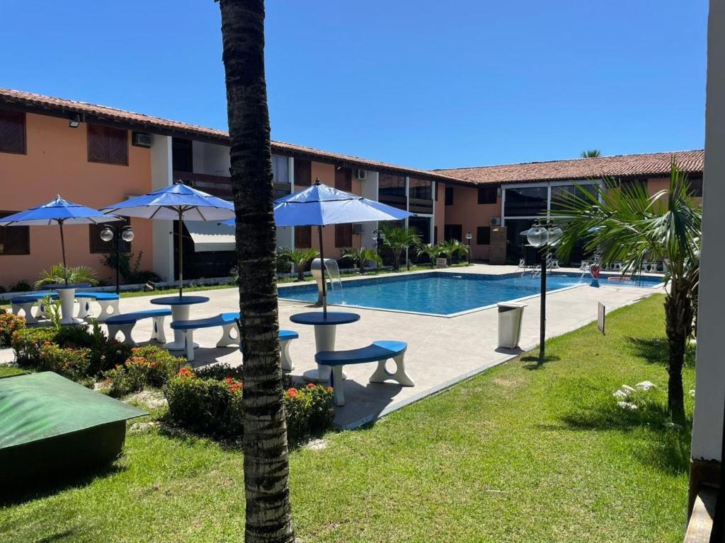 Πισίνα στο ή κοντά στο Apartamento Aconchegante