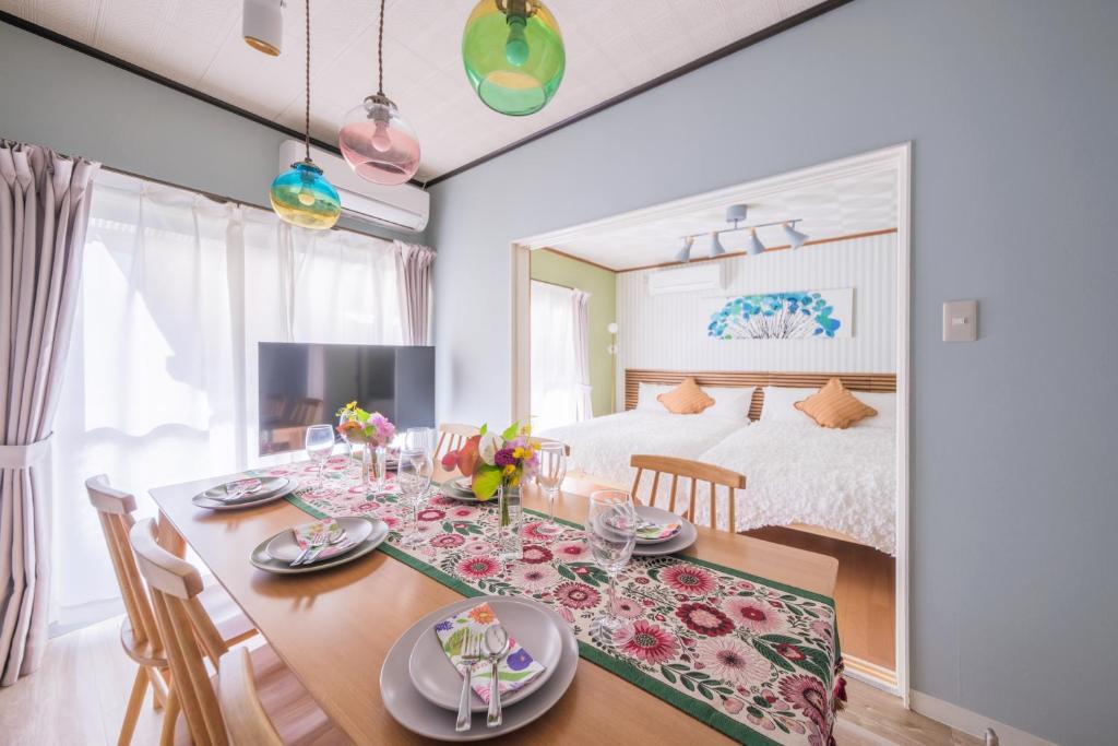 En eller flere senge i et værelse på Sen no Yado Nagashima Nagoya