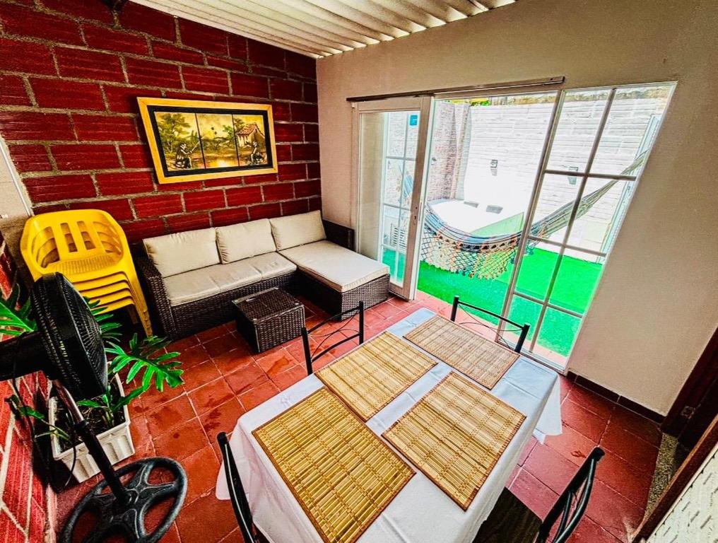 Et opholdsområde på APARTAMENTO MINCA SUITE In