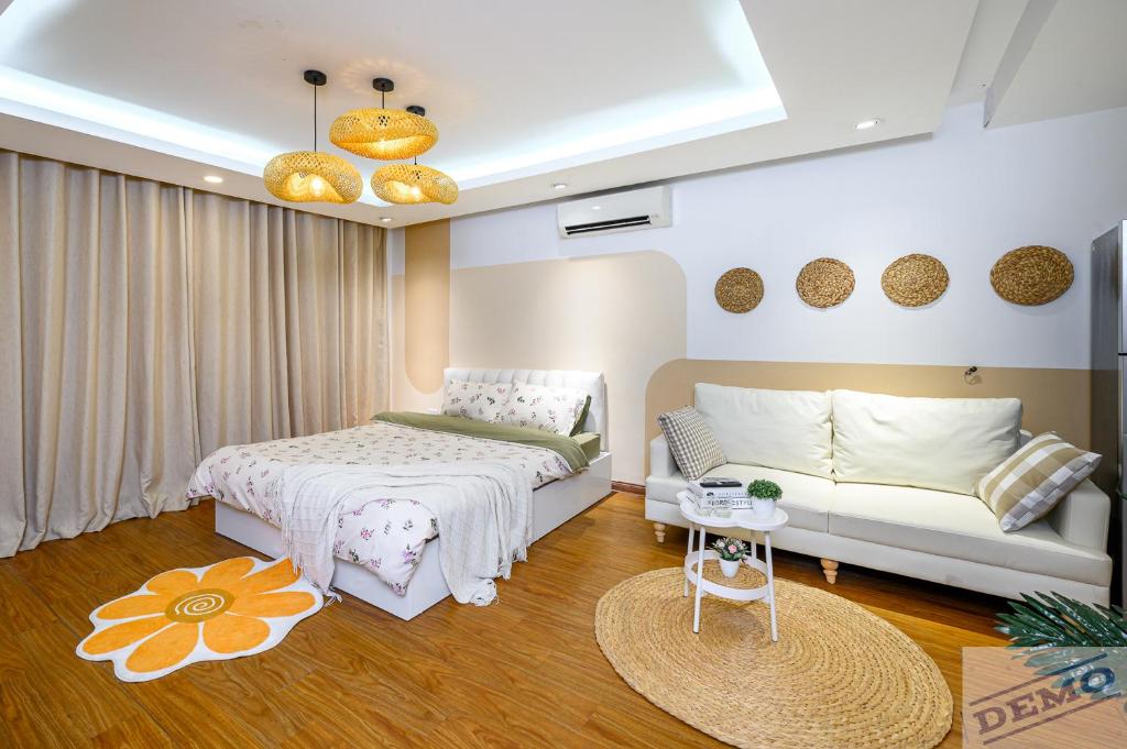 Ένα ή περισσότερα κρεβάτια σε δωμάτιο στο Paradise Ton Duc Thang by Luxe Hospitality