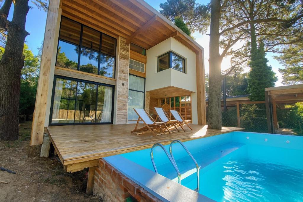 Swimmingpoolen hos eller tæt på Designer house in Valeria del Mar