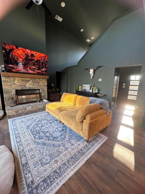 a living room with a couch and a fireplace at North Ga Hideaway in Ranger