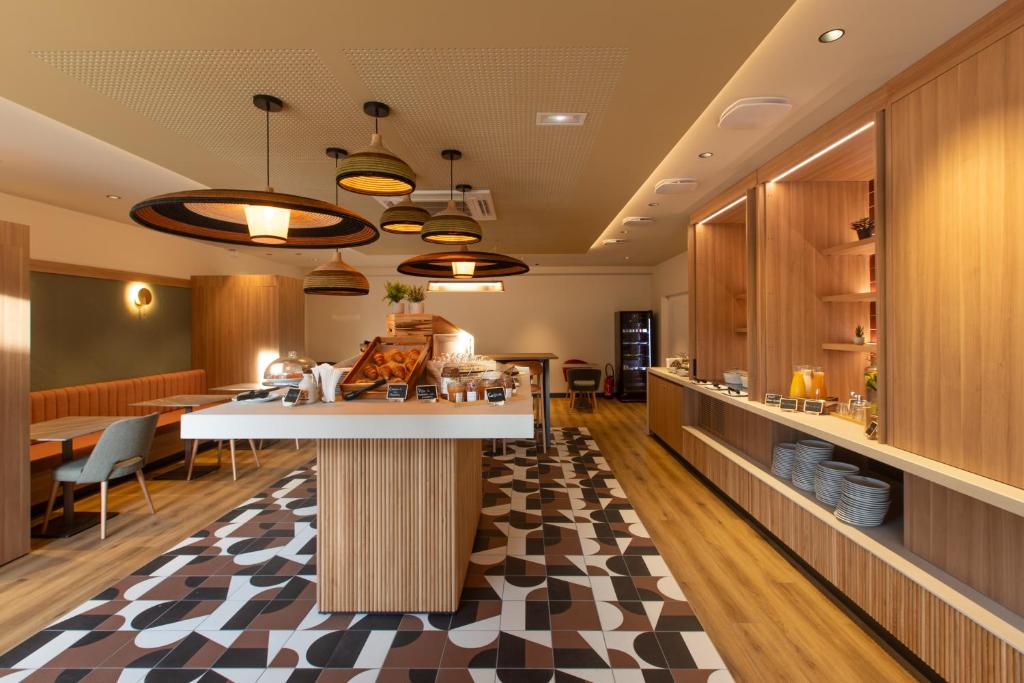 Posezení v ubytování Campanile Reims Centre - Cathedrale