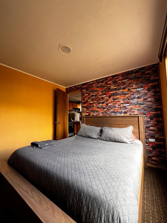 Ένα ή περισσότερα κρεβάτια σε δωμάτιο στο Apartamentos Natales May 21