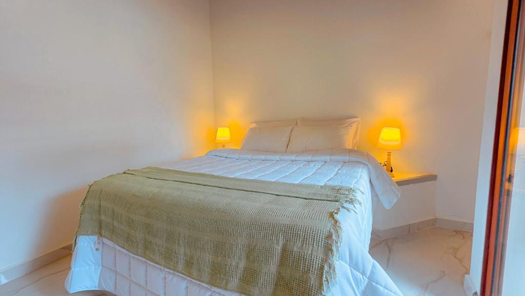 Postel nebo postele na pokoji v ubytování Riviera Hotel Boutique