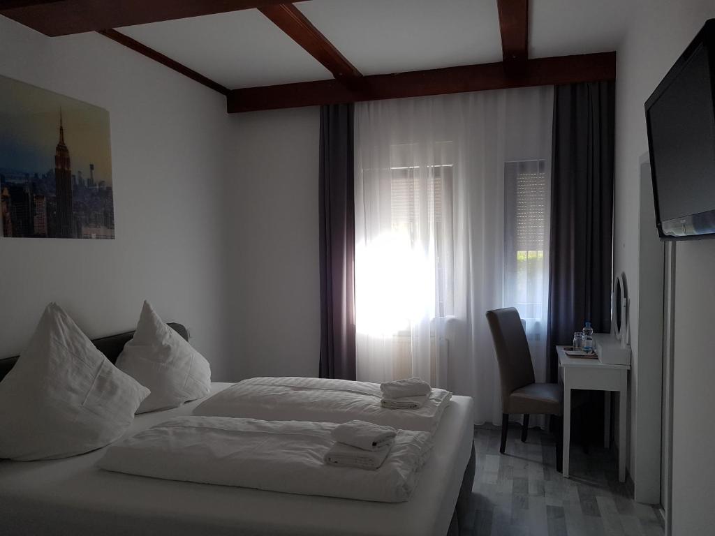 Postel nebo postele na pokoji v ubytování Das SP Hotel