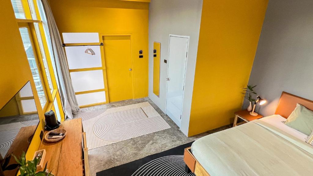 Ein Bett oder Betten in einem Zimmer der Unterkunft CenterPoint Thong Sala