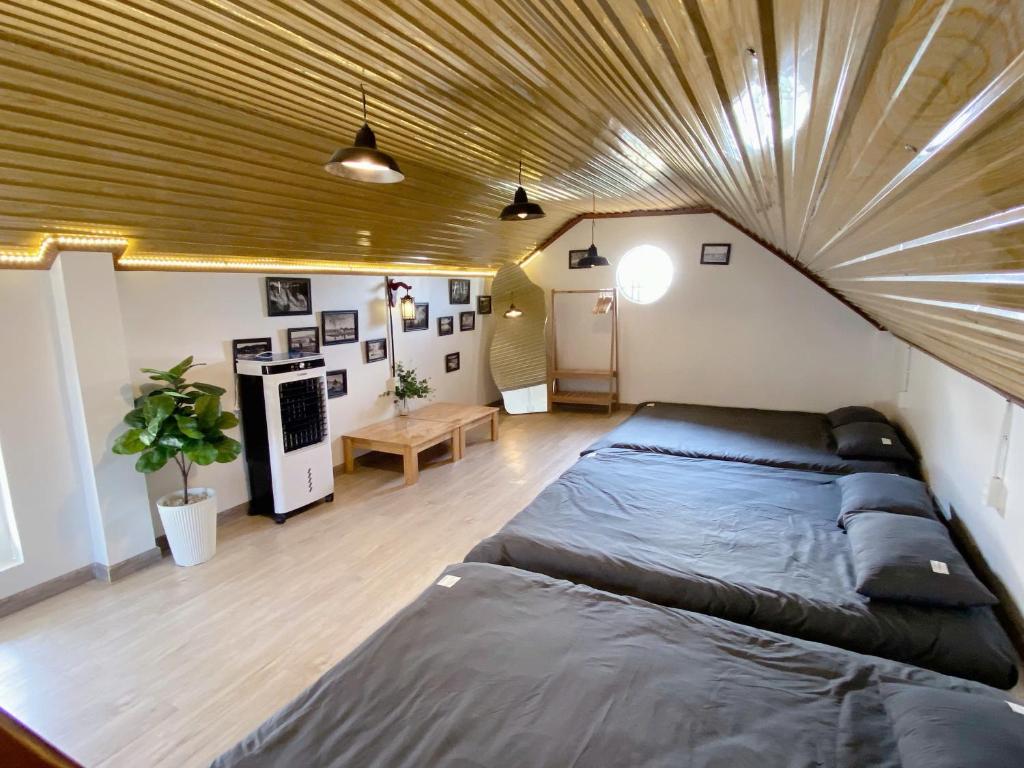 Giường trong phòng chung tại Villa Tường Vy - Đà Lạt