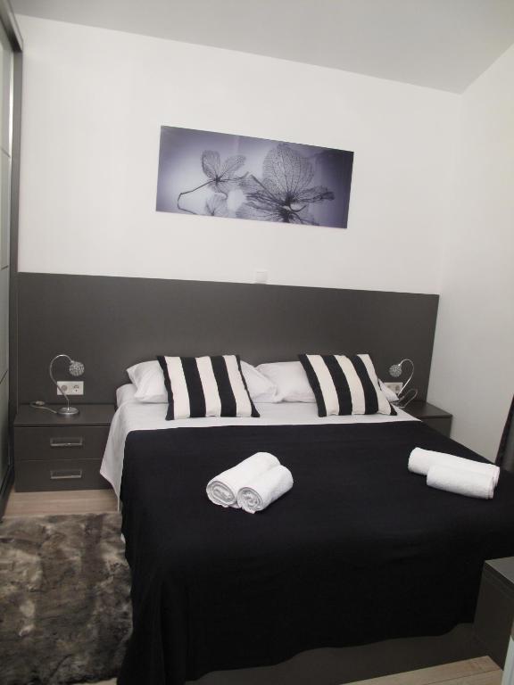 Postel nebo postele na pokoji v ubytování Apartments Mia Krk
