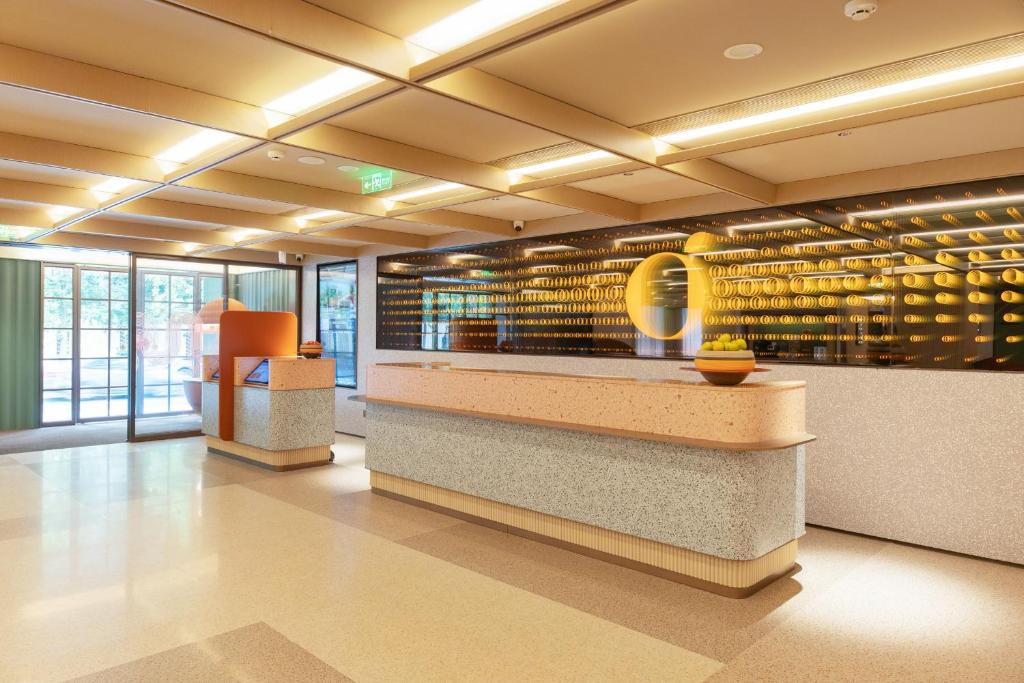 Ο χώρος του λόμπι ή της ρεσεψιόν στο Orange Hotel Chengdu Sichuan Normal University Subway Station