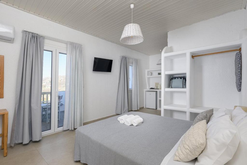 Ένα ή περισσότερα κρεβάτια σε δωμάτιο στο Vavoulas Village