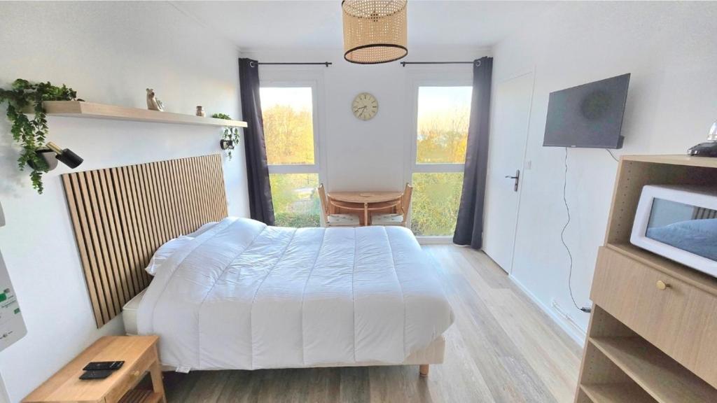 Ένα ή περισσότερα κρεβάτια σε δωμάτιο στο Studio Cosy 1pers