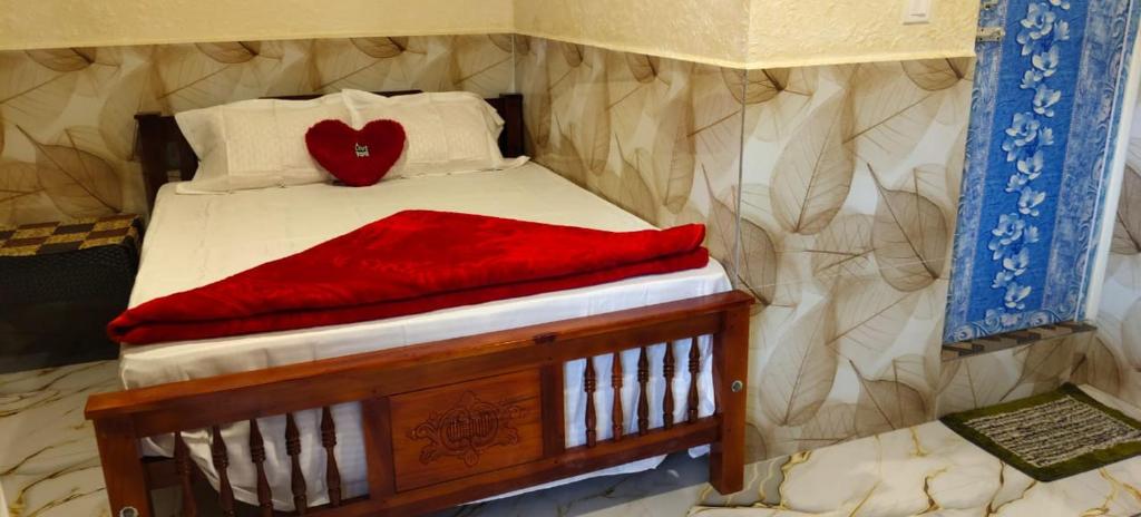 Postel nebo postele na pokoji v ubytování Nakshatrahomestay